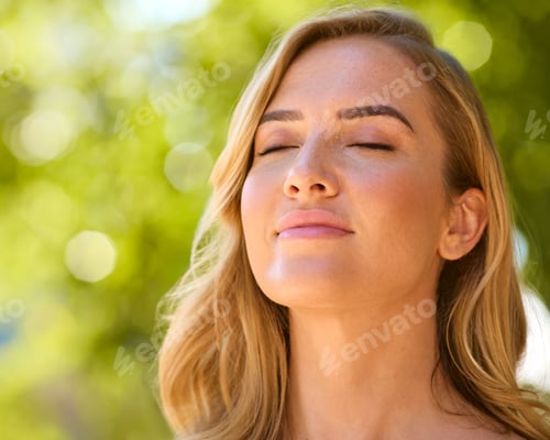 Preview: Woman Outdoors Relaxing In Countryside Closing Eyes And Breathing Deeply Enjoying Calm Of Nature
