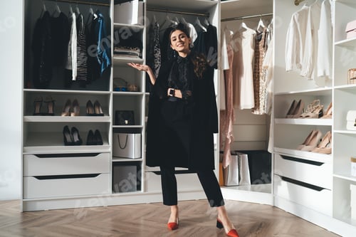 Preview: Woman demonstrating outfit in wardrobe