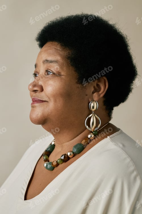 Preview: African American Woman Wearing Statement Jewelry and Smiling