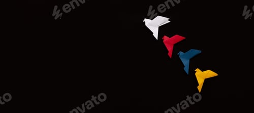 Preview: banner three paper origami pigeons white, red, blue and yellow fly up diagonally on black background
