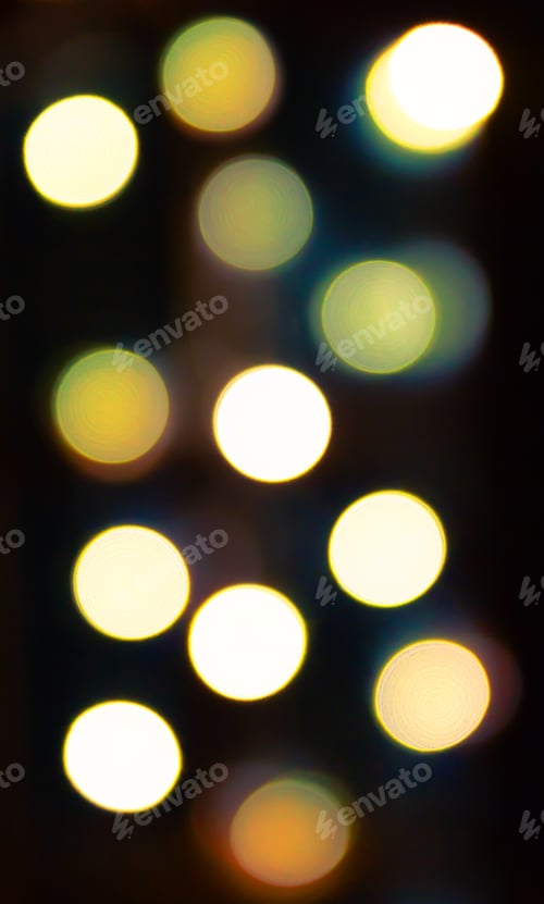 Preview: Blurred bokeh lights background in golden tones