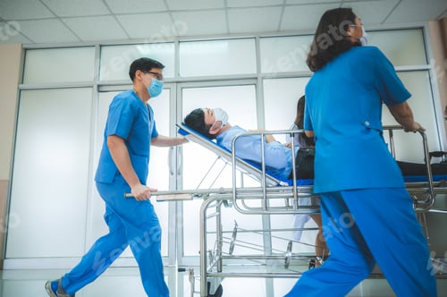 Preview: Emergency Department: Doctors and Nurses moving Seriously Injured Unconcious Patient
