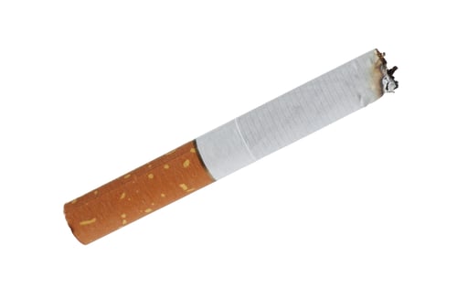 Preview: One burnt cigarette butt isolated on white
