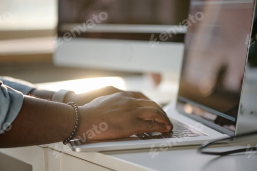 Preview: Hand on Black Keyboard