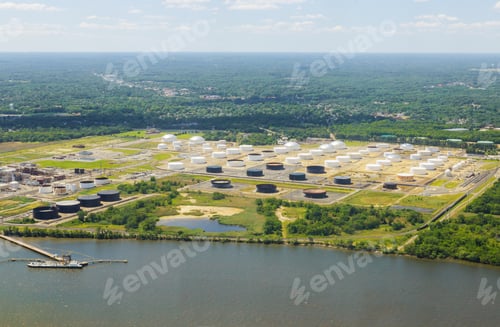 Preview: Tanker ship loading unloading oil and gas storage at industrial port