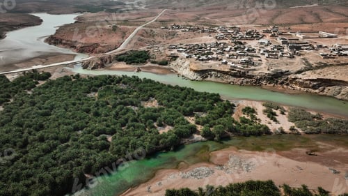 Preview: Aerial view of Socotra Island showcases lush greenery and remote riverside settlements