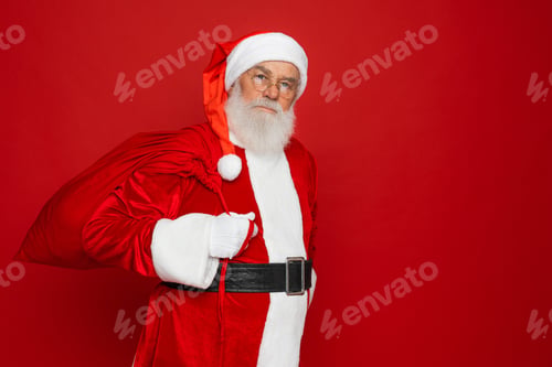 Preview: Santa Claus holding sack bag with Merry Christmas presents delivering xmas gifts isolated background