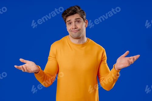 Preview: Man Shrugging in Confusion Wearing Orange Longsleeve Shirt