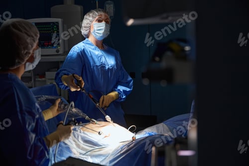 Preview: Surgeons during laparoscopic abdominal operation in patient surgery in hospital