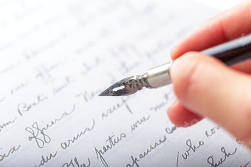 Preview: Writing with a fountain pen on paper in a quiet setting during the afternoon