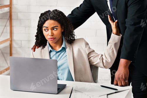 Preview: African American boss sexually harassing his female subordinate at office