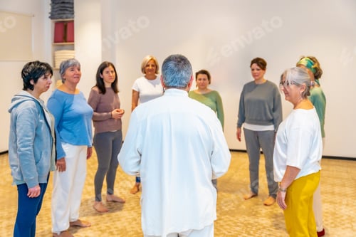 Preview: Mature students arriving in a qigong class