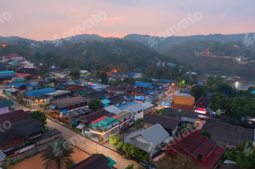 Preview: Aerial top view of houses in Mon village, Kanchanaburi, Thailand in urban city town in Asia
