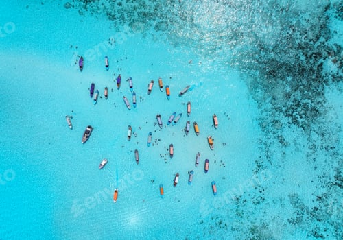 Preview: Aerial view of colorful boats, sea bay with azure water in summer