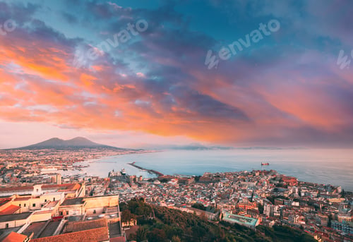 Preview: Naples, Italy. Top View Skyline Cityscape City In Evening Sunset. Tyrrhenian Sea And Landscape With
