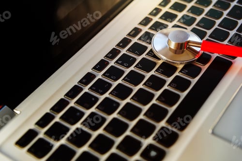 Preview: Expert examines a laptop to repair it from virus infection by internet.
