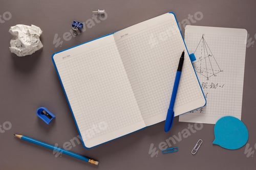 Preview: Open notepad and school stationary supplies at paper table background. Back to school flat lay