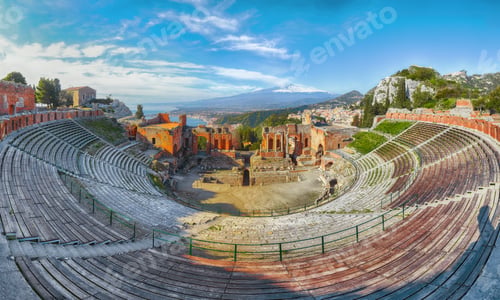 Preview: Ruins of ancient Greek theater in Taormina and Etna volcano in the background.