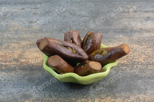 Preview: Some of salt fresh eggplants on green plate