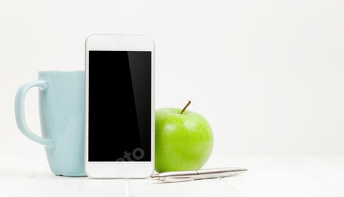 Preview: Workplace with smartphone, apple and coffee cup