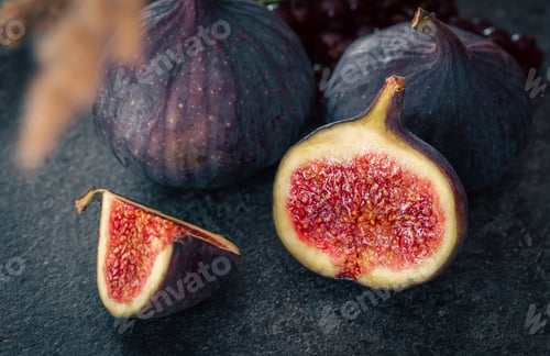 Preview: Close-up, fig fruit on a blurred dark background.