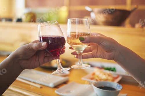 Preview: Hands, wine glass and friends toast in restaurant in celebration together. Alcohol, cheers and peop
