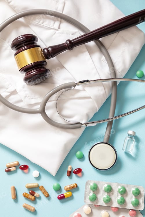 Preview: Health and Medicine legal issues. Judge gavel, medical stethoscope and medication