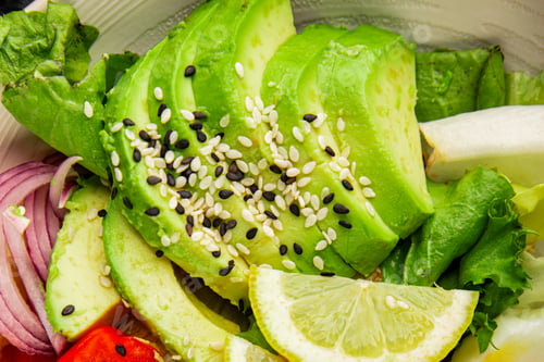 Preview: Avocado salad egg, tomato, onion, green leaf salad vegetable dish natural tasty food