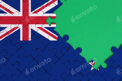 Preview: New Zealand flag is depicted on a completed jigsaw puzzle with free green copy space on the right