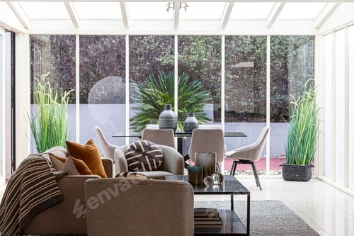 Modern Indoor Space with Glass Roof and Garden