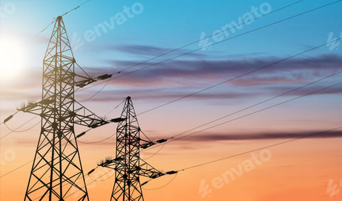 Preview: High voltage power lines and metal pylon against the backdrop of evening sunset and sunrise sky