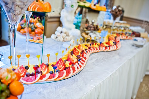 Preview: Wedding reception of fruits, decorated grapefruit apple and grape