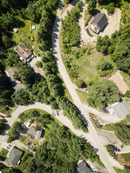 Preview: Aerial view of residential homes in a small town