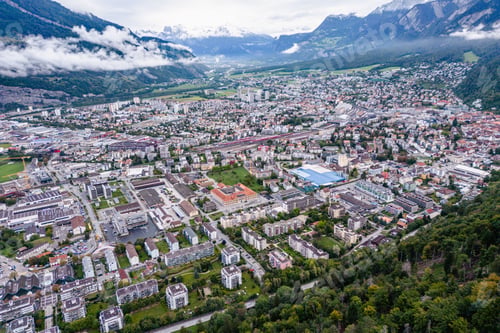 Preview: Aerial view of a city and mountain landscape in Innsbruck, Austria