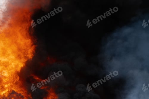 Preview: Huge Flames of Red Fire, Motion Blur Clouds of Dark Smoke Covered Sky