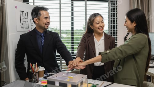 Preview: a group of architects congratulate each other after the work is successfully completed, founders of