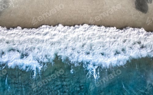 Preview: A wave on a beach provides perfect background and texture