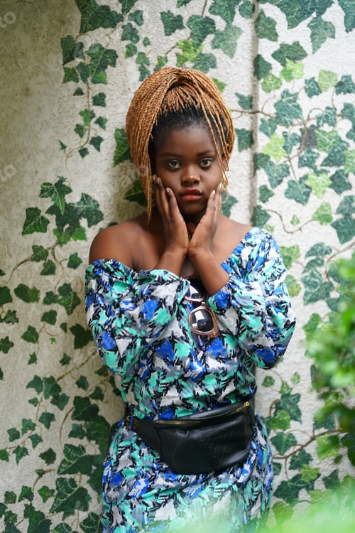 Preview: Portrait of attractive black skin young woman, Charming Afro girl. Portrait of afro girl looking at