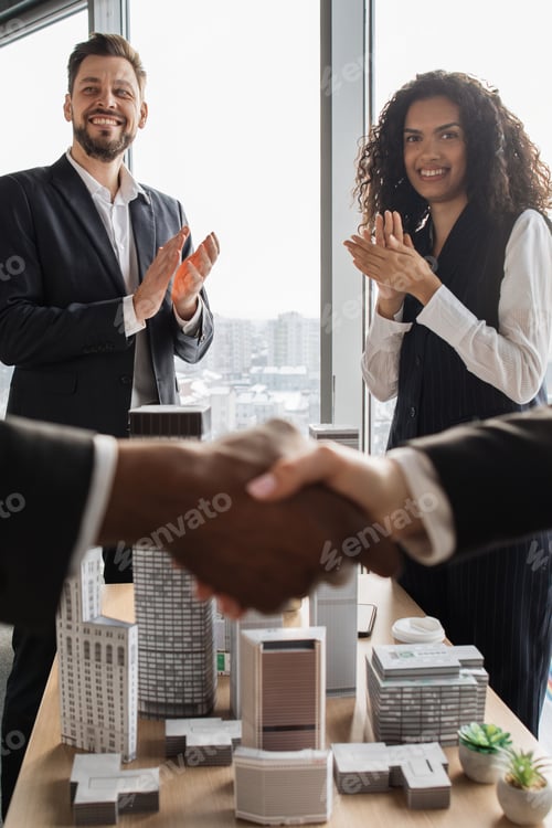 Preview: Business Deal Handshake and Applause