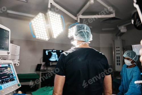 Preview: Healthcare, surgery or doctors in operating room, theater or trauma unit for anatomy emergency. Med