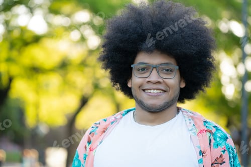 Preview: Portrait of young latin man outdoors.