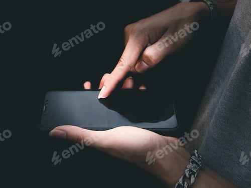 Preview: Close up of a man using mobile smart phone.