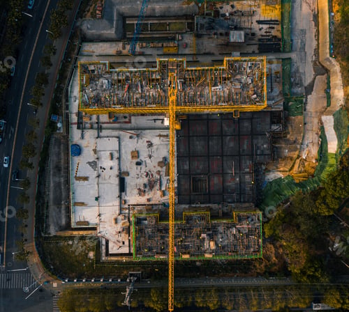 Preview: View of a bustling construction site, with workers, heavy machinery