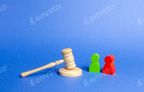 Preview: Two figures of people opponents stand near the judge