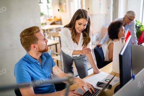 Preview: Group of software engineers working developing applications together in corporate office