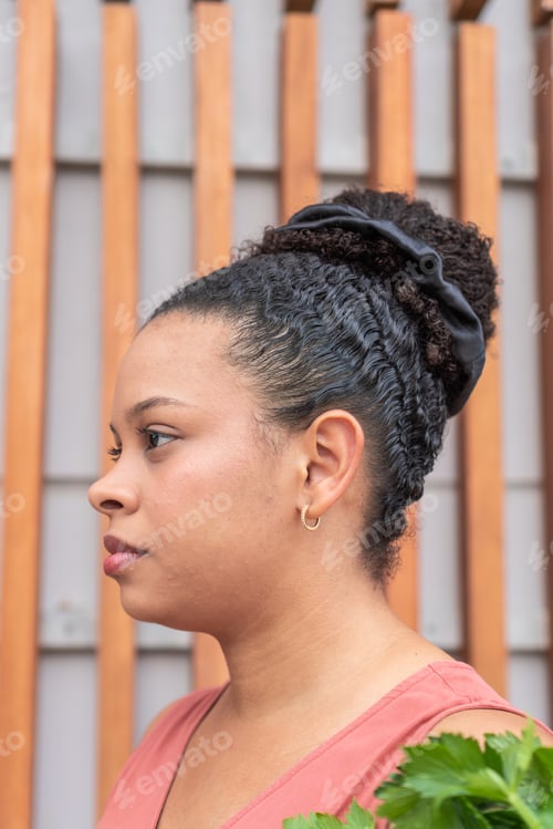 Preview: Profile View of a Woman with Fresh Herbs