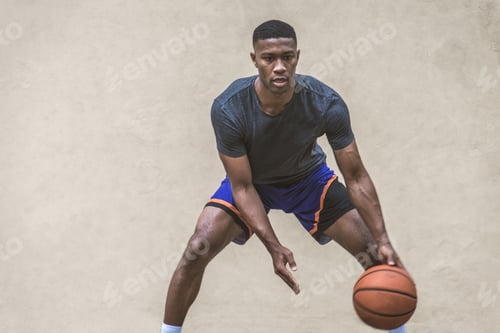 Preview: Basketball player training outdoors