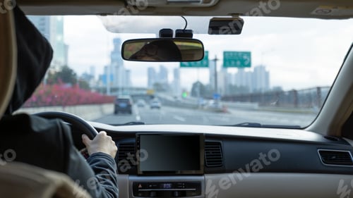 Preview: People driving car on city road