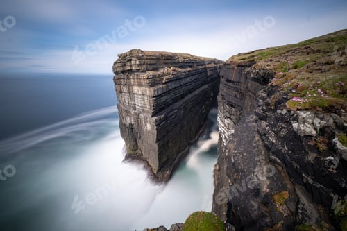 Preview: Long exposure still image of Diarmuid and Grainnes Rock at Loop Head peninsula, Ireland