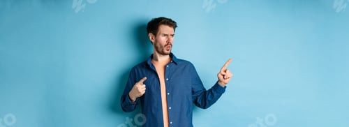 Preview: Man Pointing in Two Directions on Blue Background